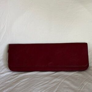 Wilson’s Leather Pelle Studio genuine Italian leather maroon clutch
